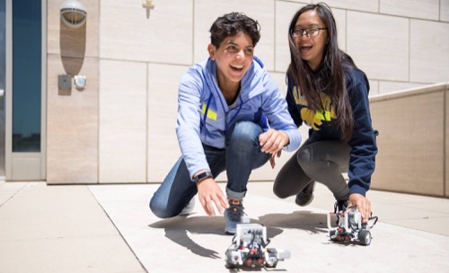 Bay Area teens learn to program a robot to behave like a cell at the Cellular Construction Workshop at UCSF.